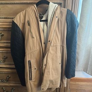 Jacket in Size Medium. Good condition. Not aware of brand.